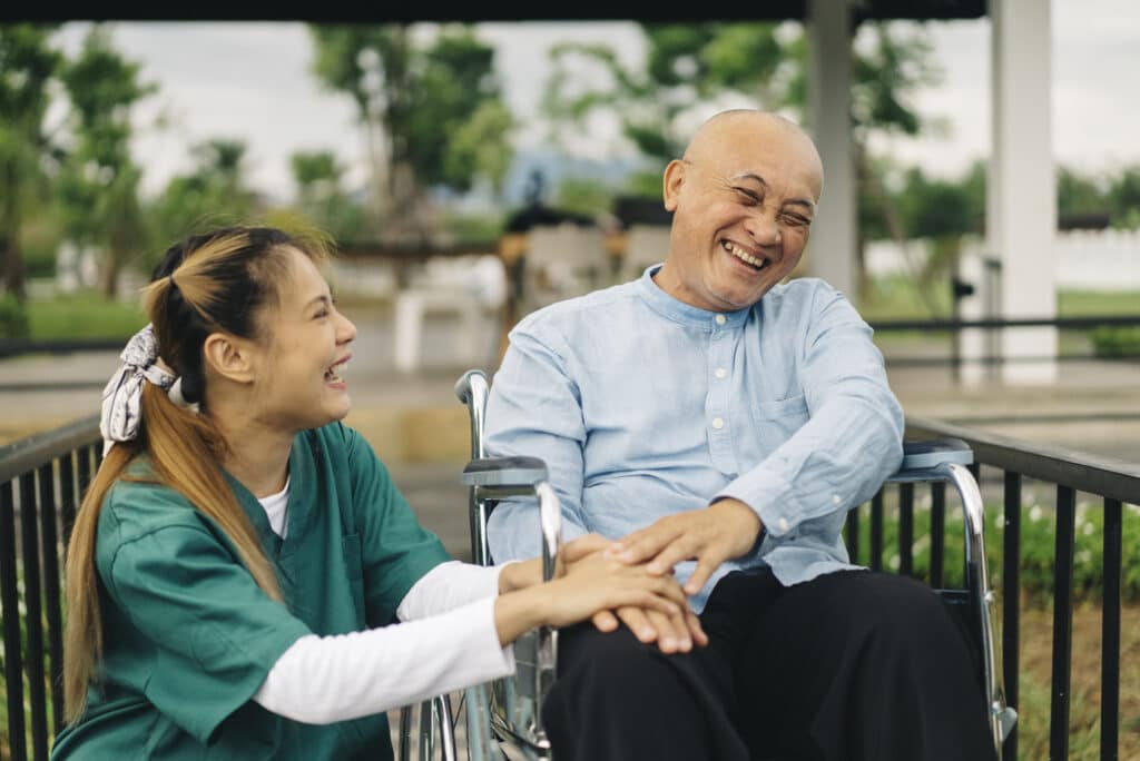 Facial expression asian seniors who are in good spirits enjoy talking with the nurse at the health care center aging gracefully concept